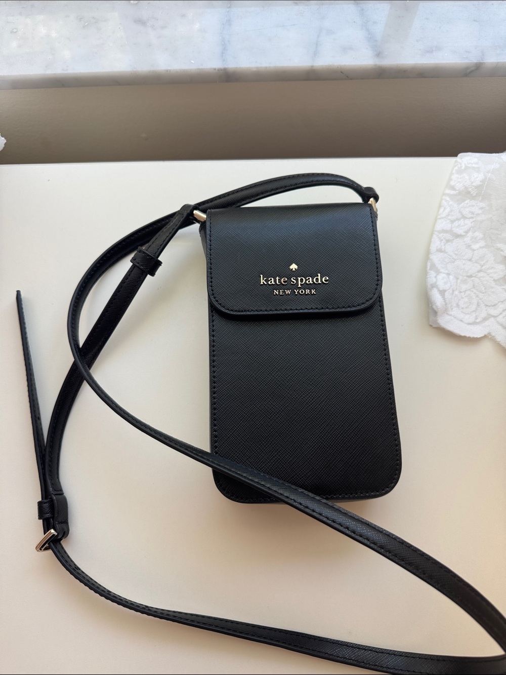 Kate Spade black Saffiano crossbody phone pouch
